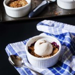 Gluten-Free Blueberry Peach Crisp - only 8 ingredients and 15 minutes prep and you're on your way to the perfect bowlful of sweet fruit and nutty topping | justalittlebitofbacon.com