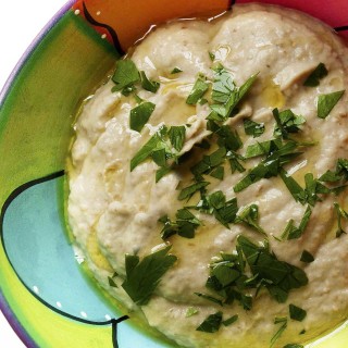 Baba Ghanoush - This creamy, smoky eggplant dip lightened with a bit of mayonnaise will have you going back for more. | justalittlebitofbacon.com