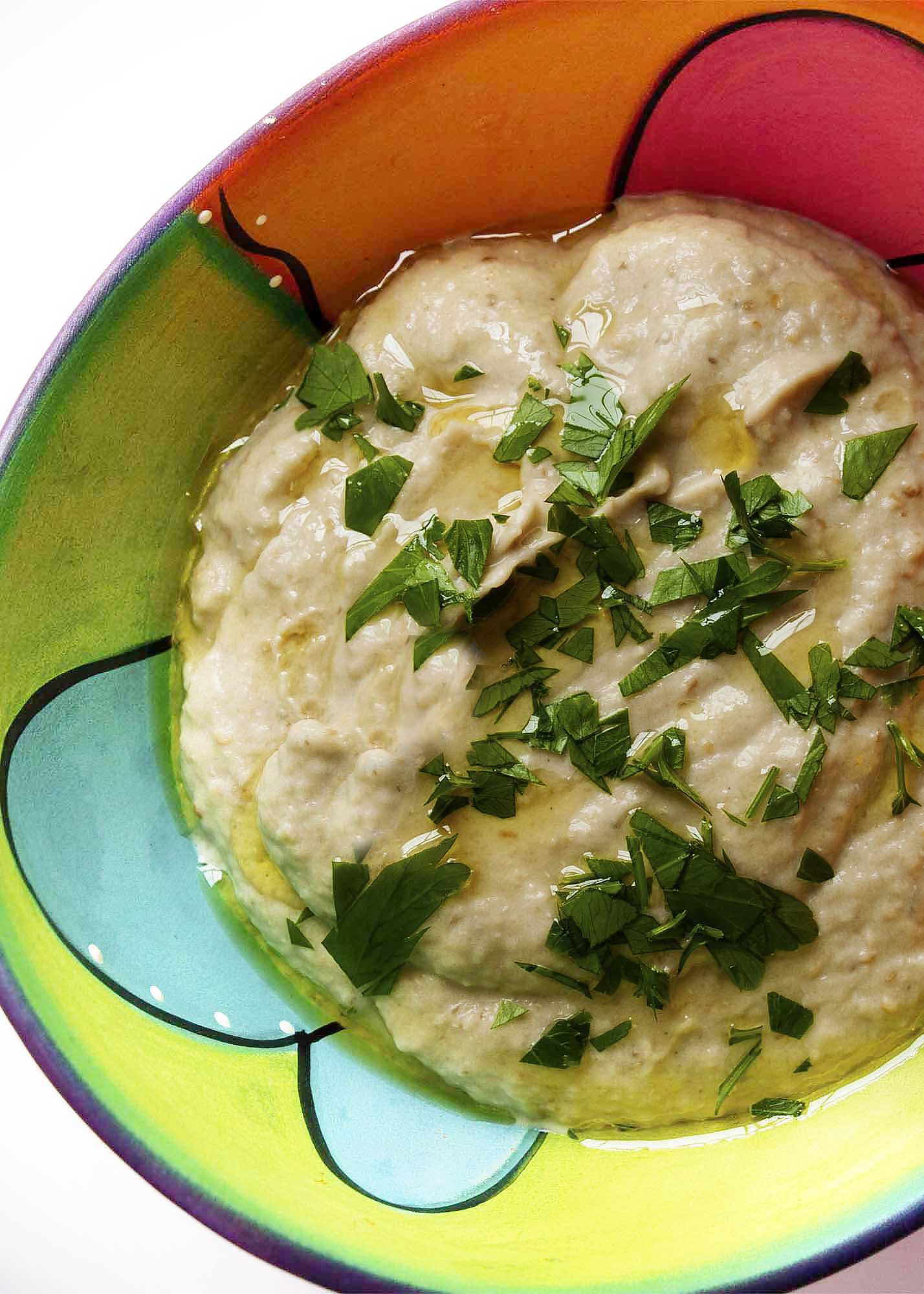 Baba Ghanoush - This creamy, smoky eggplant dip lightened with a bit of mayonnaise will have you going back for more. | justalittlebitofbacon.com