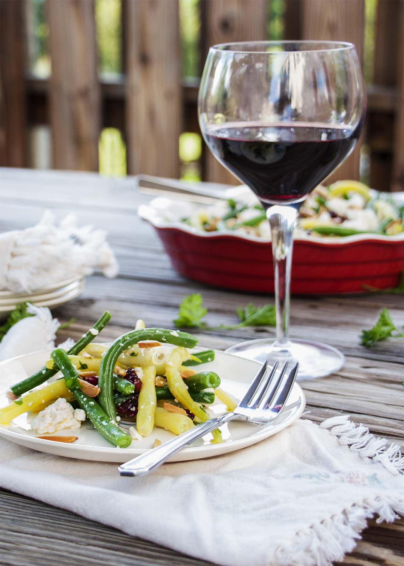 Green Bean Salad with Goat Cheese and Almonds - This salad is the perfect balance of sweet, salty, and crunchy, all combined with tender green beans. It's the only green bean salad you will ever need. | justalittlebitofbacon.com