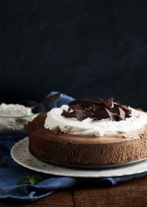 Dark Chocolate Mousse Pie - Dark chocolate whipped up into a creamy mousse layered over a crisp cookie crust and topped with mounds of whipped cream. Yum! | justalittlebitofbacon.com
