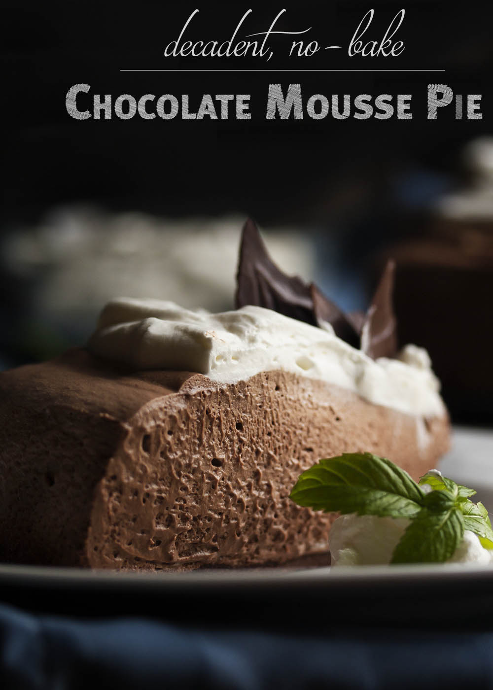Dark Chocolate Mousse Pie - Dark chocolate whipped up into a creamy mousse layered over a crisp cookie crust and topped with mounds of whipped cream. Yum! | justalittlebitofbacon.com