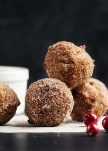 Cinnamon Sugar Apple Fritters - A snap to make, these apple fritters are little pillows of happiness full of chopped apples and covered in cinnamon sugar. And you just need one, little easy trick to turn out perfectly shaped fritters every time. | justalittlebitofbacon.com