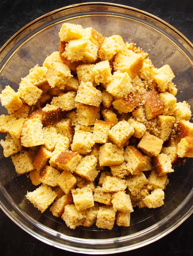 Gluten-Free Stuffing Cornbread - Savory, tangy, dense. This cornbread is perfect for stuffing with enough structure to stand up to mixing. | justalittlebitofbacon.com