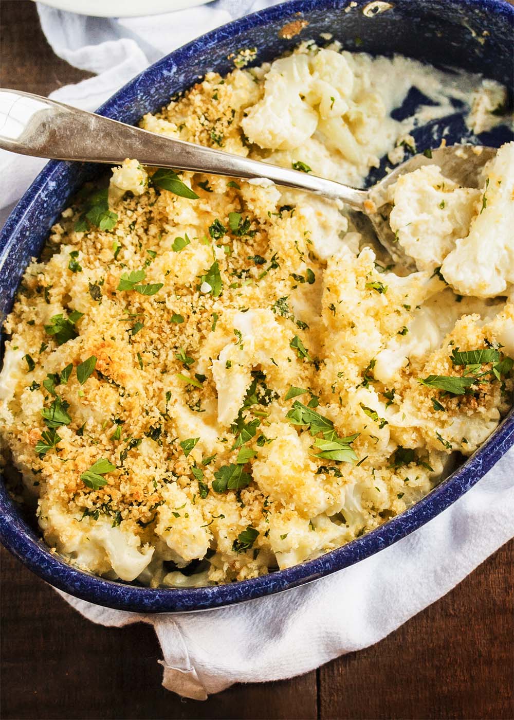This Cauliflower Gratin in a Horseradish Cheese Sauce is comfort food that would be great on your holiday table or any other day of the year. A little spicy, a little creamy, a little cheesy, and a lot delicious. | justalittlebitofbacon.com
