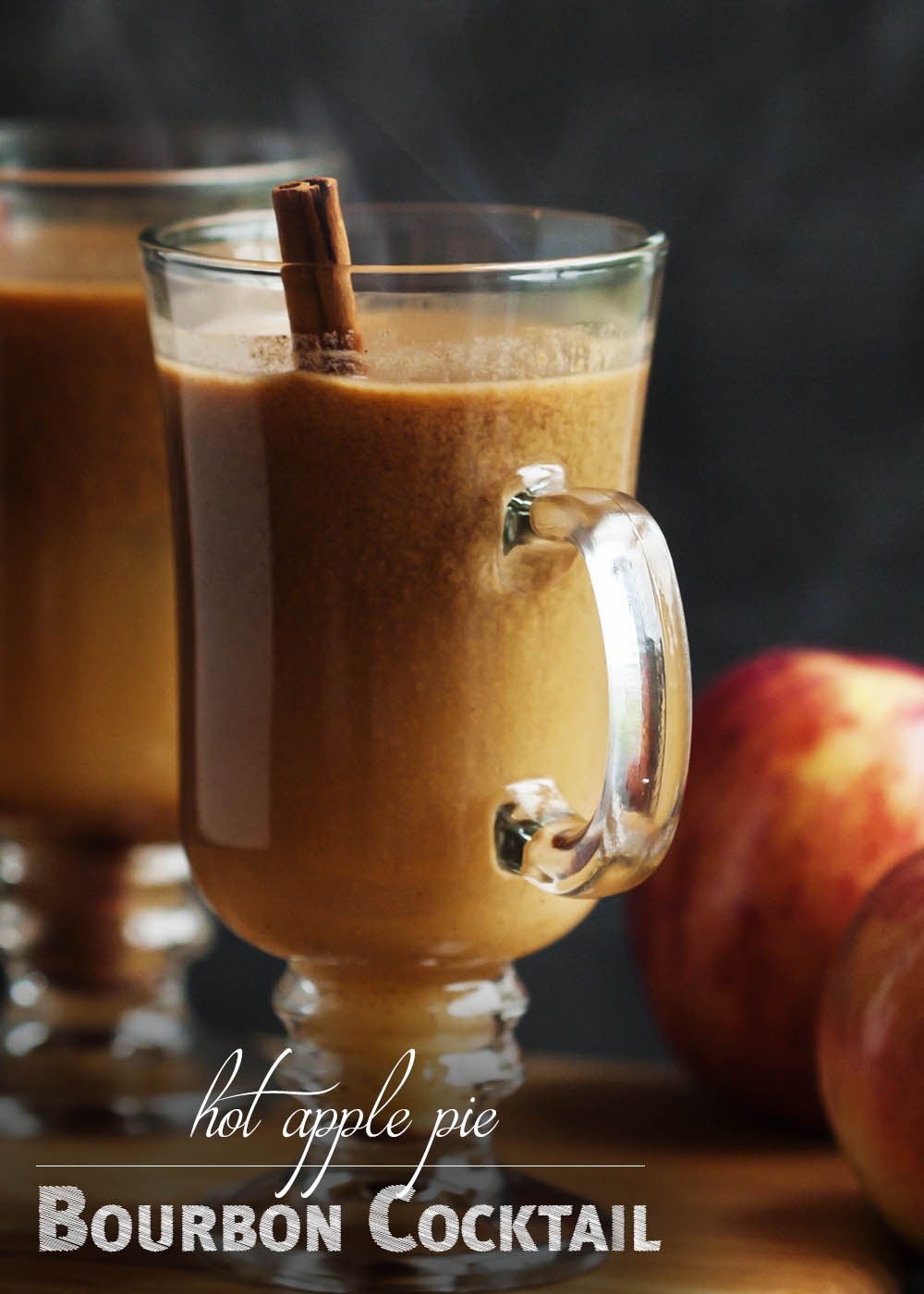 Hot Apple Pie Bourbon Cocktail - This twist on hot buttered bourbon uses cider and butterscotch sauce to make the perfect thanksgiving or fall cocktail. | justalittlebitofbacon.com