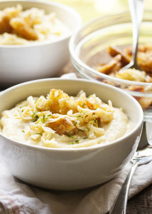 Slow Cooker Potato Leek Soup - Comforting, creamy, cheesy, and now even easier to make, this potato leek soup delivers all the flavor for only minutes of work. | justalittlebitofbacon.com