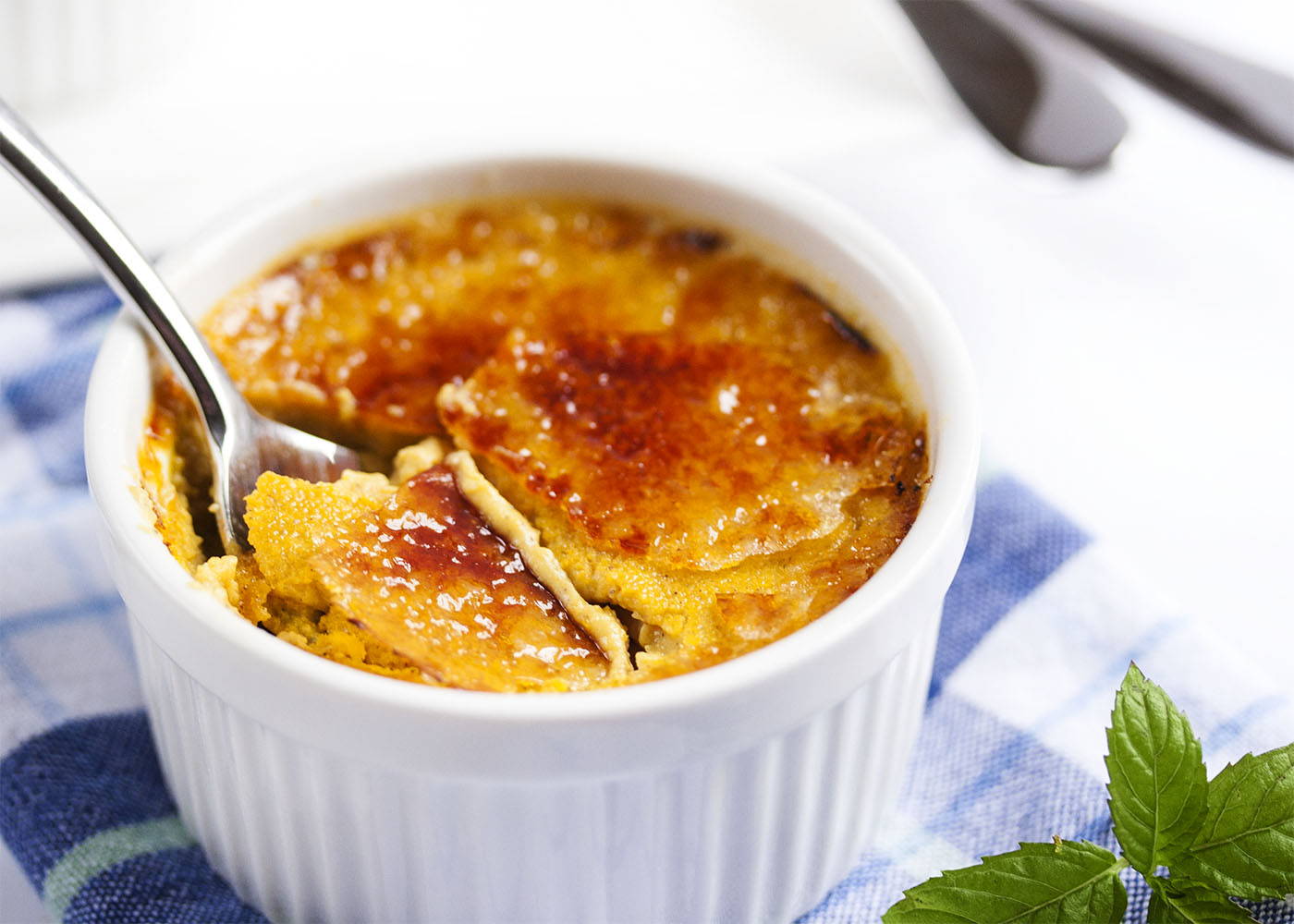 Sunshine Squash Creme Brulee - Caramelized sugar topping and a yummy, squash custard makes for a dish that is creamy, comforting and a great way to make something different with winter squash. | justalittlebitofbacon.com