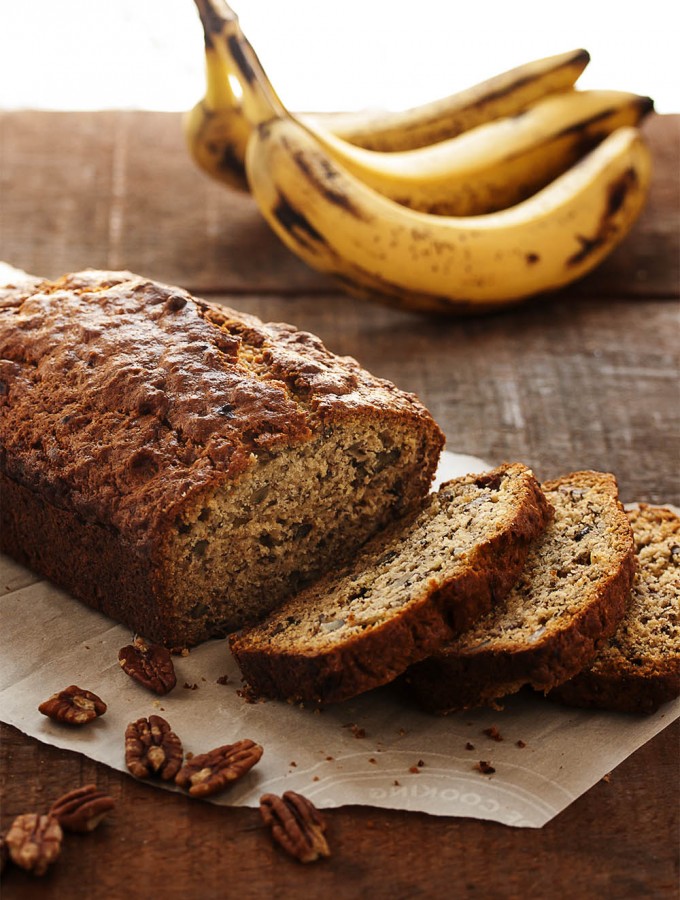 Bourbon Pecan Banana Bread - This bourbon pecan banana bread is a great basic banana bread! Dense and moist and full of lots of banana flavor, all enhanced with a dollop of bourbon. This is a recipe you will make again and again. | justalittlebitofbacon.com