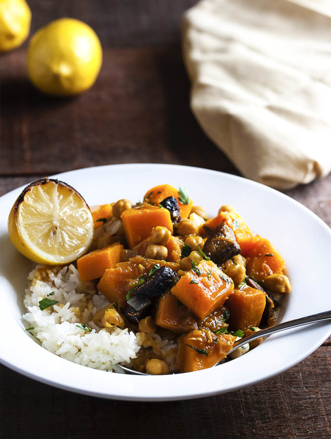 Vegetarian Butternut Squash Tagine - Need a quick vegetarian entree? You won't miss the meat in this flavorful and rich tasting vegetarian butternut squash tagine. It's sweet and spicy and yummy. And it's vegan so long as you skip the optional yogurt! | justalittlebitofbacon.com