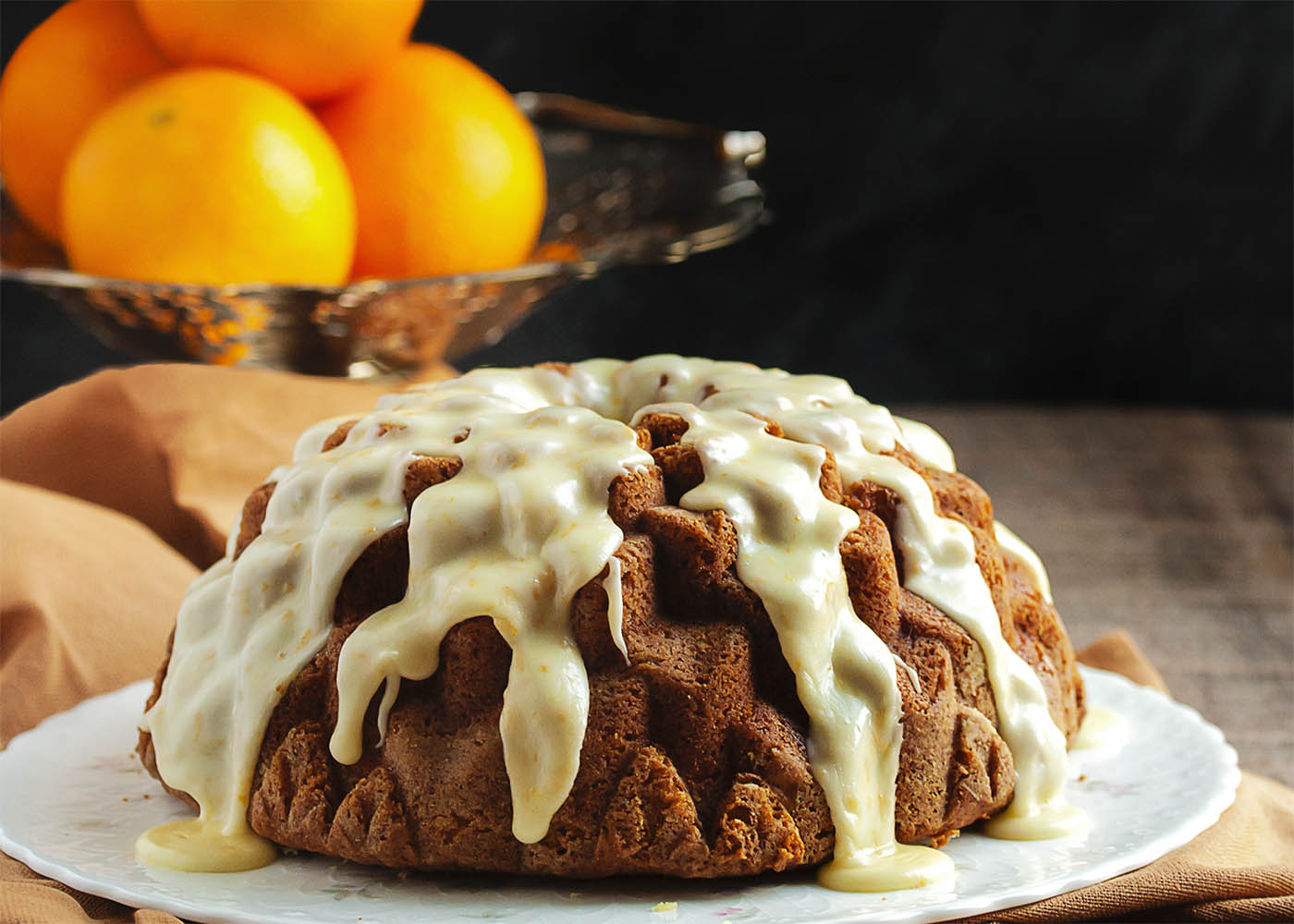 Cara Cara Orange Bundt Cake - This moist and rich bundt cake has a fine crumb and loads of orange flavor! One taste, and no matter where you are or what the season, it's summer again. | justalittlebitofbacon.com