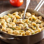 Hamburger Mac and Cheese - This kid-pleasing, stove-top mac and cheese combines ground beef, sharp cheddar, and diced tomatoes to make a great, quick weeknight meal. | justalittlebitofbacon.com