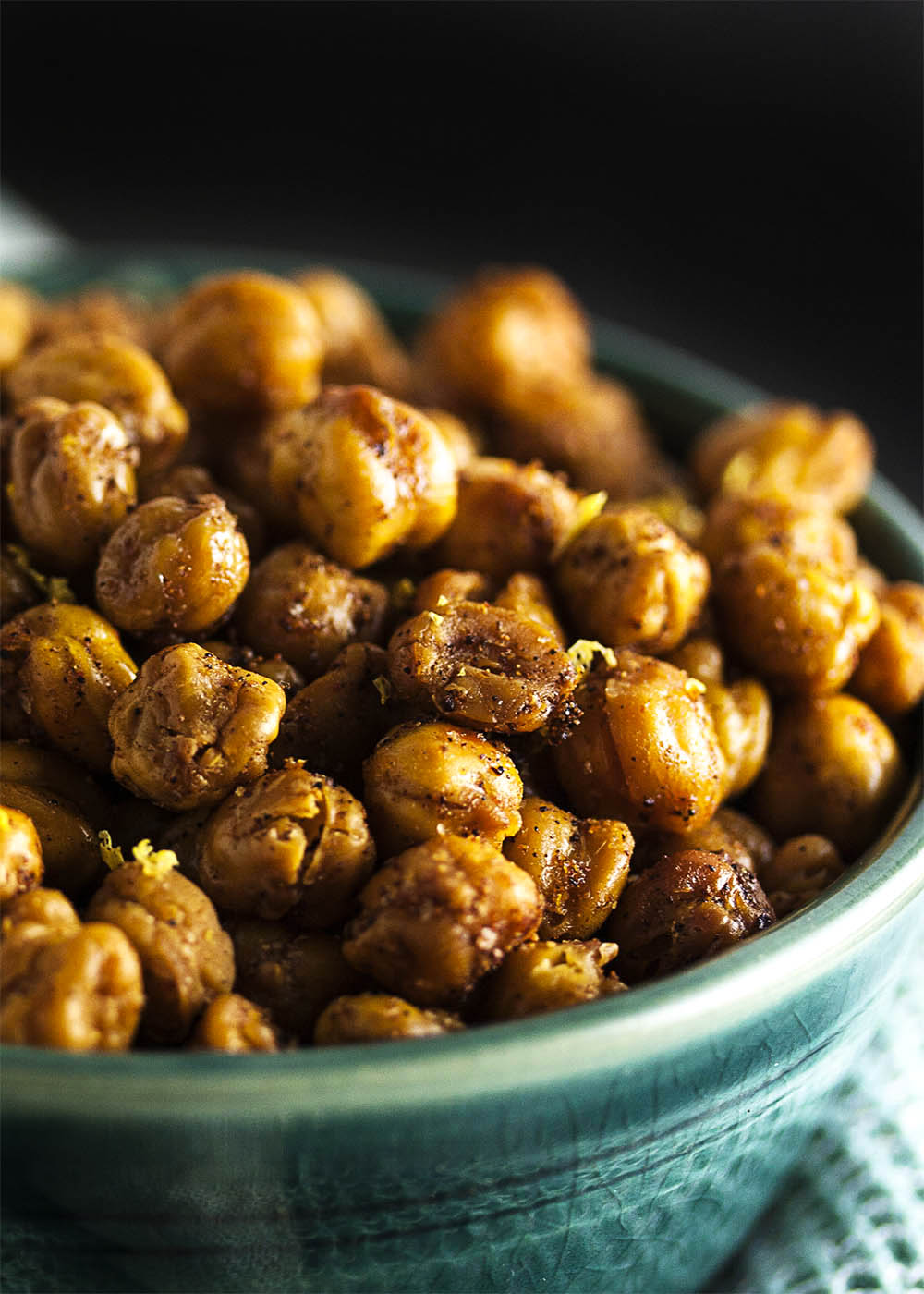 Spiced Dry Roasted Chickpeas - Dry roasting chickpeas produces an incredibly crunchy, tasty, and easy snack. And it's even healthy too! Just be careful - they're addictive. | justalittlebitofbacon.com