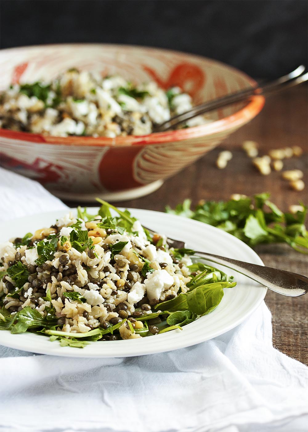 Brown Rice and Green Lentil Salad - This easy salad packs a big nutritional punch. Brown rice, green lentils, pine nuts, arugula and feta combine into a healthy and tasty side dish. | justalittlebitofbacon.com