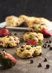 Strawberry Chocolate Chip Buttermilk Scones - This easy buttermilk scone batter is lightly sweetened and filled with fresh strawberries and bittersweet chocolate chips. Cut them into traditional wedges or pull out the heart-shaped cookie cutter and make these for someone you love. | justalittlebitofbacon.com