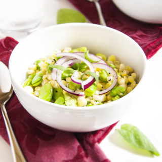 Fresh Corn and Fava Bean Salad - This fresh and flavorful salad of corn and fava beans is a great way to take that tiny pile of fava beans which you extracted from a giant pile of bean pods and turn it into a satisfying side dish. | justalittlebitofbacon.com