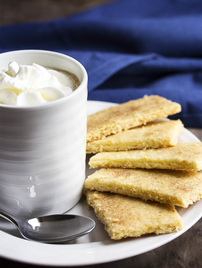 Lemony Shortbread Cookies - These lemon shortbread cookies are classic butter cookies with a tender, crumbly texture. So easy to roll out or press into your pan! They are great plain, topped with flavored sugar, or dipped in chocolate. | justalittlebitofbacon.com