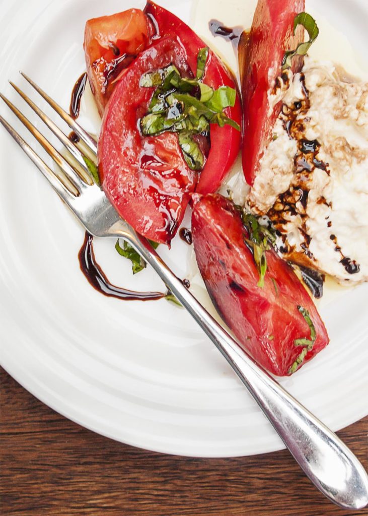 Tomato, Basil Caprese Salad - This salad is a example of taking the freshest ingredients using them simply and producing incredible results. | justalittlebitofbacon.com