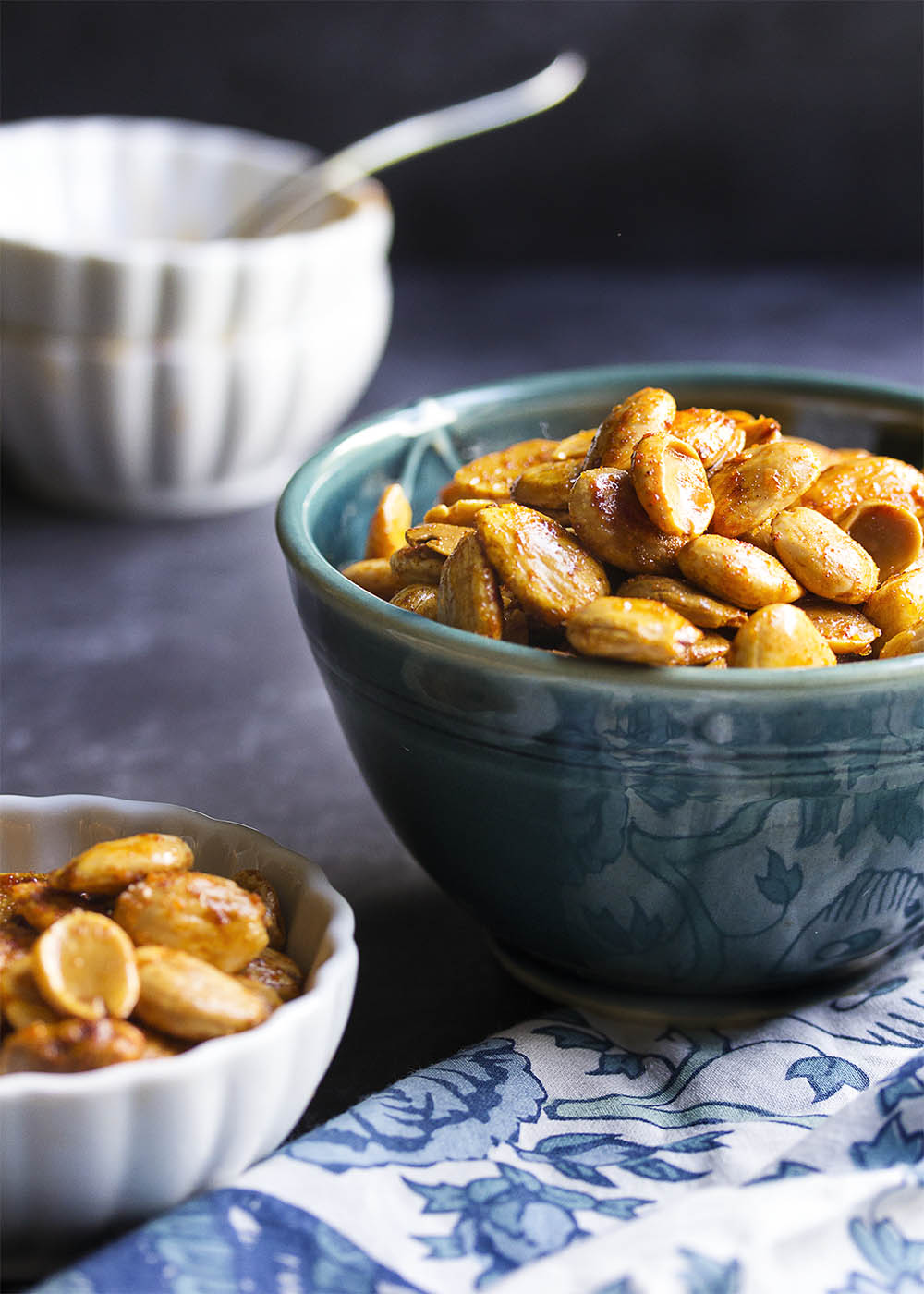 Spanish Spiced Almonds - Creamy, sweet marcona almonds are toasted and tossed in a flavorful paprika-spiked spice blend in this recipe for Spanish spiced almonds. | justalittlebitofbacon.com