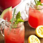 Watermelon Mint Lemonade - Watermelon mixed with lemonade and spiked with mint syrup is a wonderfully refreshing summer beverage, perfect for any hot day. Have it as is, or spike it with a shot of rum for a boozy version. | justalittlebitofbacon.com