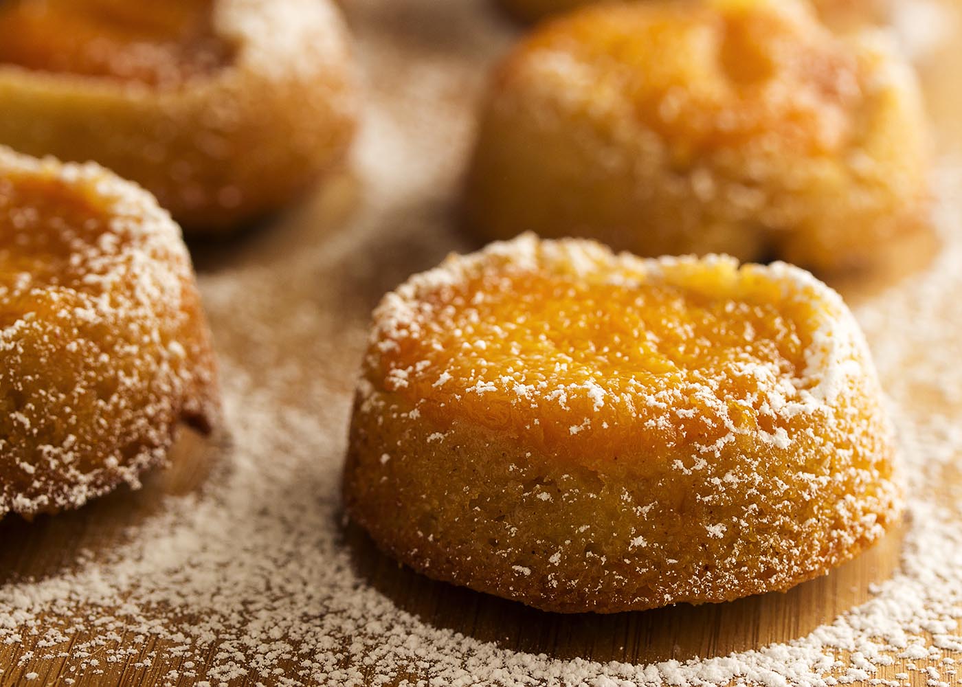Gluten-free mini upside down cakes are moist and tender from the apricot jam and almond flour, then finished with a slice of apricot. | justalittlebitofbacon.com