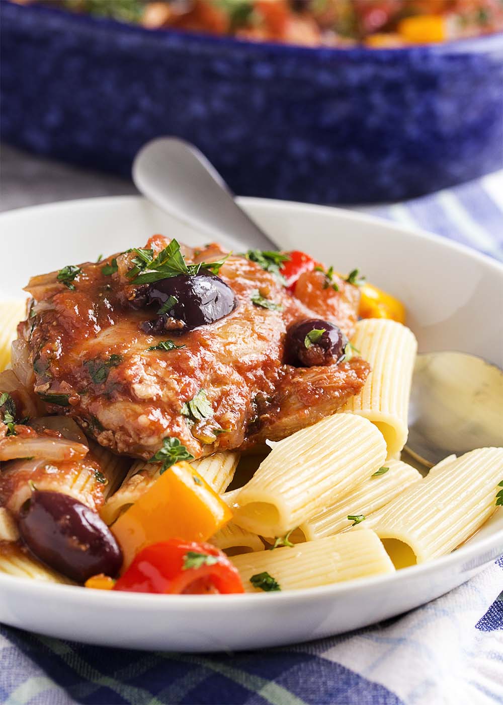 Slow cooker chicken cacciatore is classic Italian comfort food made easy. Put it together in the morning and have dinner in the evening. | justalittlebitofbacon.com
