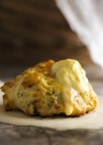 Zucchini cheddar biscuits are soft, tender and full of shredded zucchini and sharp cheddar. Just drop them onto the baking tray and go. | justalittlebitofbacon.com