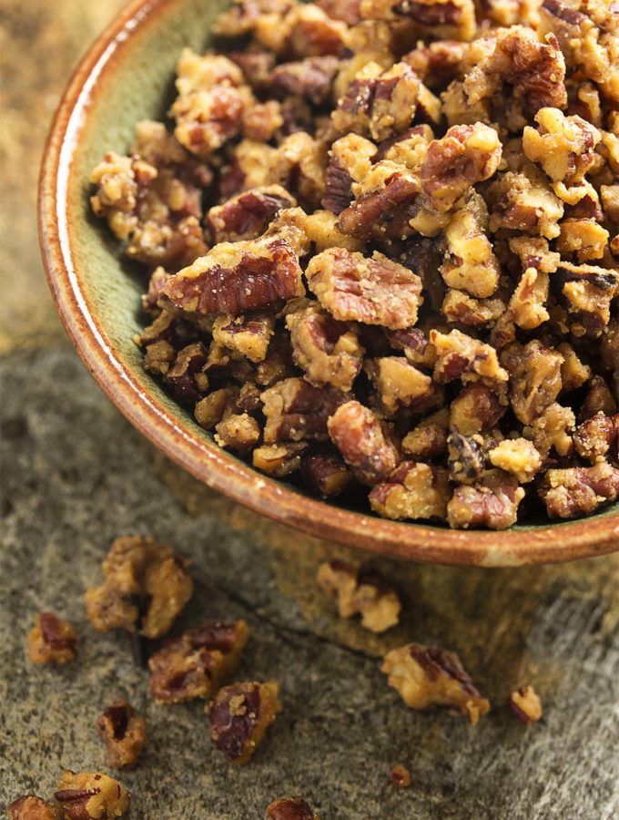 Making glazed pecans for salads and snacks couldn't be easier than with this simple 3-ingredient recipe for maple glazed pecans. | justalittlebitofbacon.com