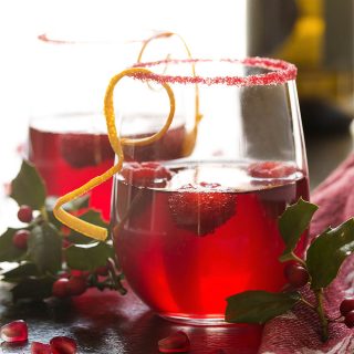 Easy, delicious, and full of bubbles! This pomegranate prosecco cocktail has everything you need for a great holiday drink. | justalittlebitofbacon.com
