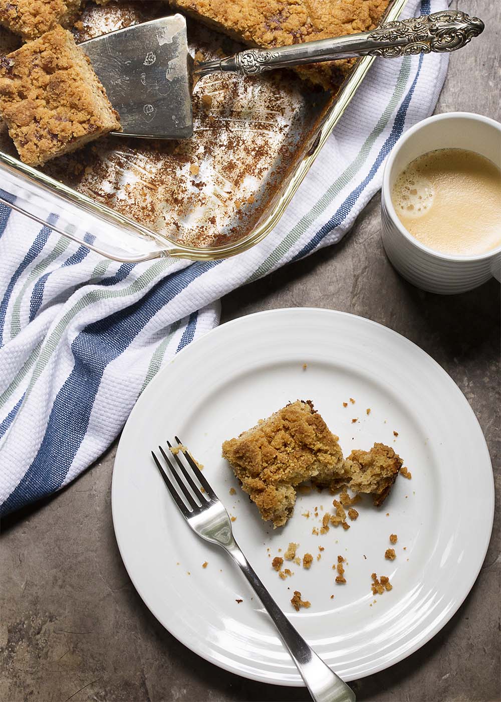 This easy moist banana cake with a buttery crumb topping is a great way to use up those overripe black bananas on your counter! | justalittlebitofbacon.com