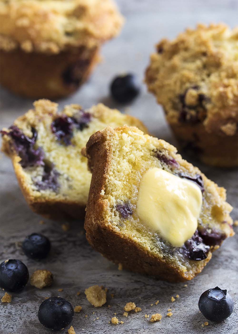 Meyer lemons provide a great, complex, floral flavor to this easy recipe for crumb topped blueberry ricotta muffins. Great for breakfast or any time of the day! | justalittlebitofbacon.com