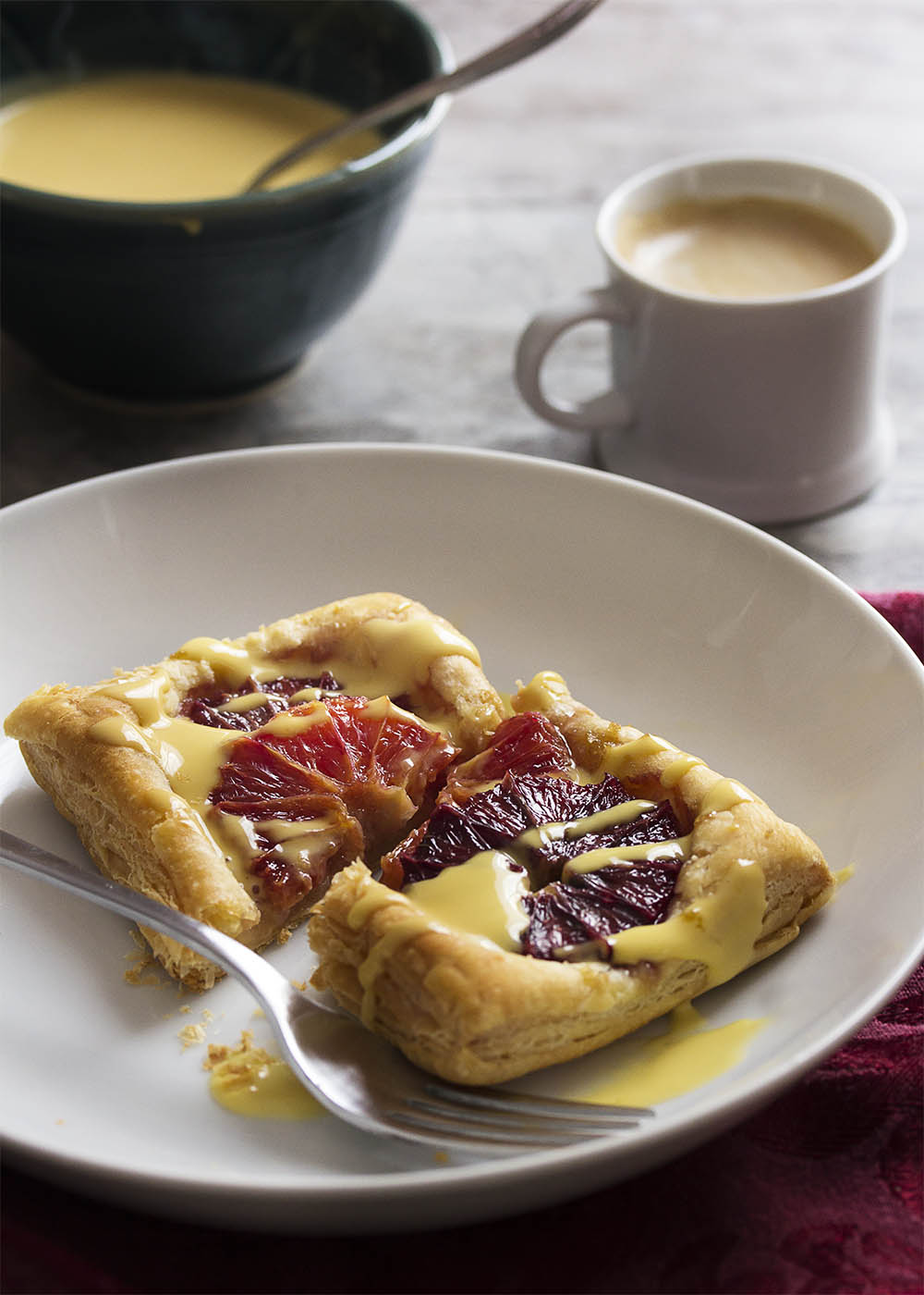 Looking for an easy but impressive dessert? Puff pastry and blood oranges make these orange galettes both beautiful and a snap to bake. | justalittlebitofbacon.com