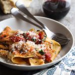 This 20 minute Italian arrabbiata sauce full of chunky tomatoes and red peppers is a simple recipe great for a quick, weeknight meal. | justalittlebitofbacon.com