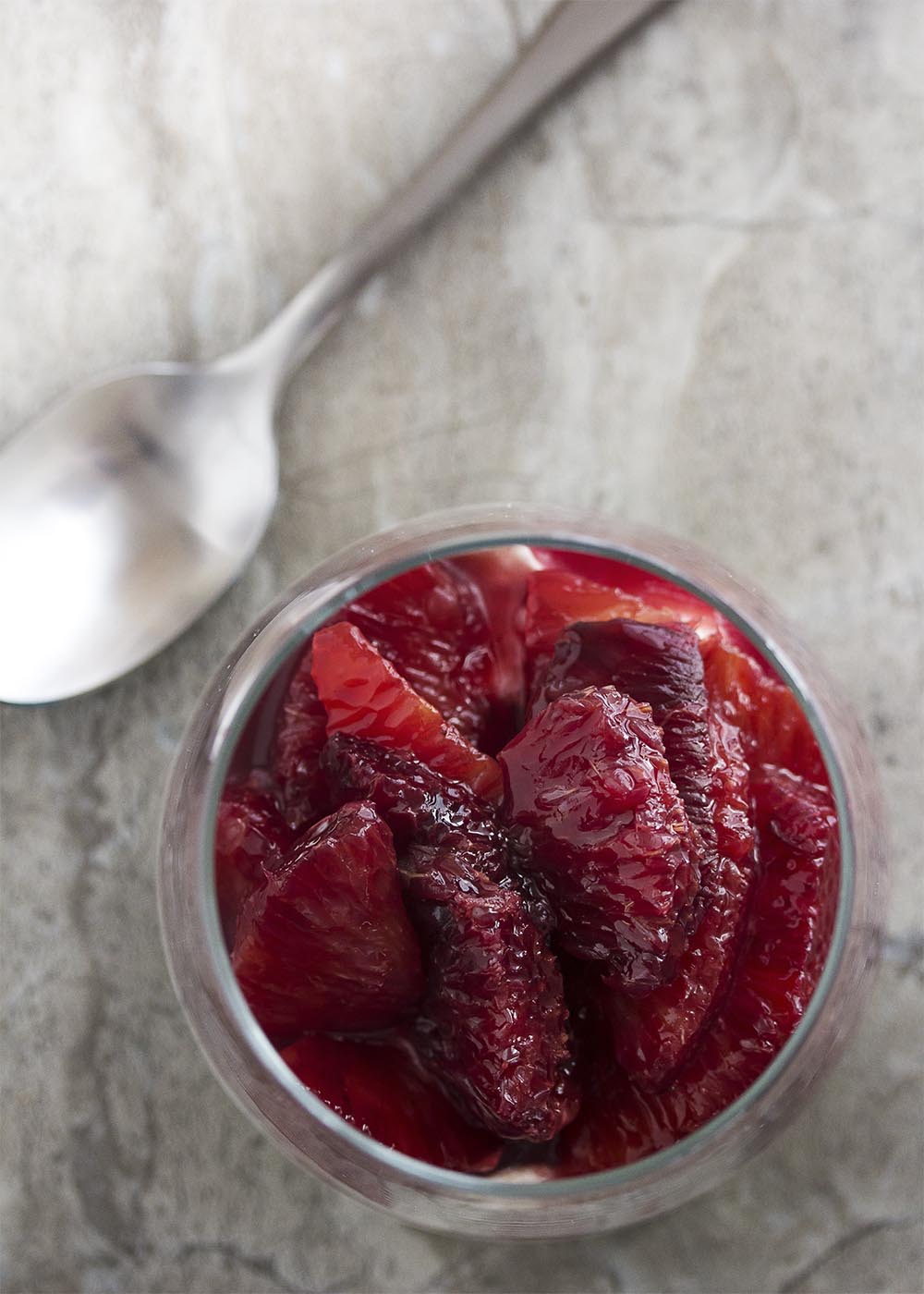 Ruby red and cinnamon spiced, this blood orange compote is a beautiful and intensely flavored sauce perfect for spooning over creamy mascarpone mousse. | justalittlebitofbacon.com