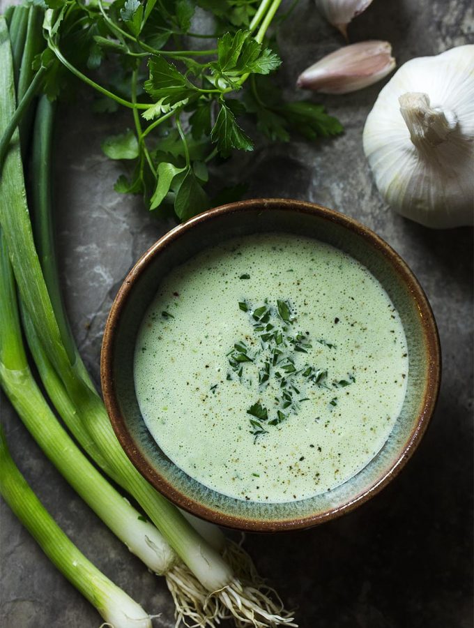 Jalapenos and scallions give this versatile green goddess buttermilk dressing a little kick and buttermilk gives it a great tang. Use it as a dressing for salads, a sauce for seafood and chicken, or as a dip! | justalittlebitofbacon.com