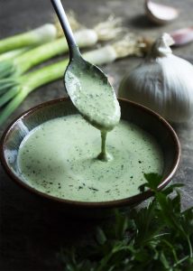 Jalapenos and scallions give this versatile green goddess buttermilk dressing a little kick and buttermilk gives it a great tang. Use it as a dressing for salads, a sauce for seafood and chicken, or as a dip! | justalittlebitofbacon.com