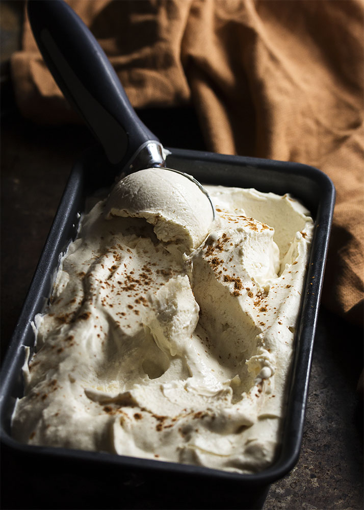 No ice cream machine? Try no churn ricotta ice cream! It's spiced with cinnamon and topped with toasted pistachios and chopped chocolate. Cannoli filling in frozen form which you can make in minutes. | justalittlebitofbacon.com