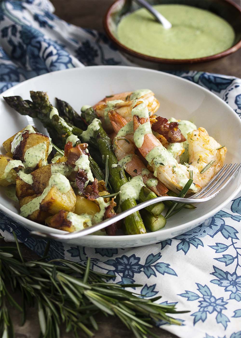 Healthy and easy! This roasted shrimp, asparagus, and potato sheet pan dinner will have food on the table in no time, but without a pile of pots to wash. | justalittlebitofbacon.com