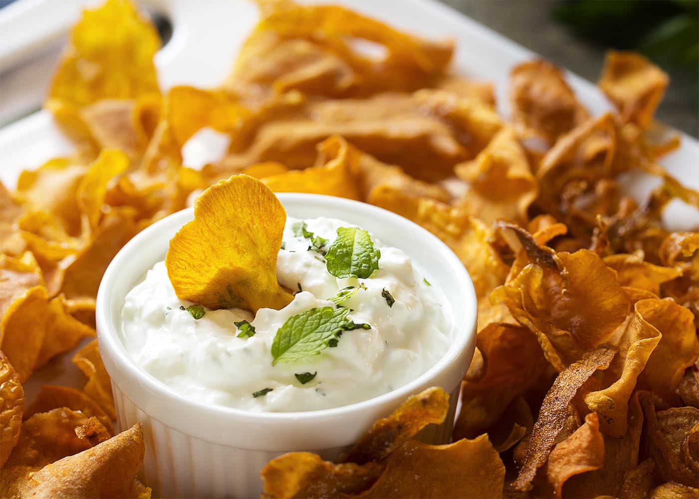 Homemade root vegetable chips are a great change from the usual potato and tortilla chips! Crispy, fried, and full of flavor. | justalittlebitofbacon.com