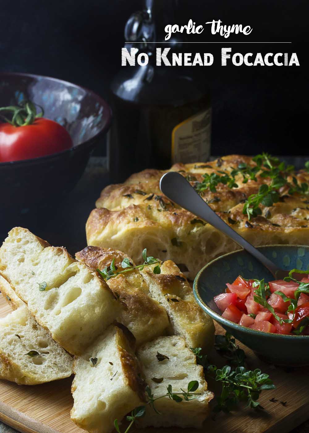 My no-knead focaccia bread with garlic and thyme is made right in a cast iron skillet, giving it a soft and chewy interior and crispy edges. Easy! Great for dinner or for paninis! | justalittlebitofbacon.com