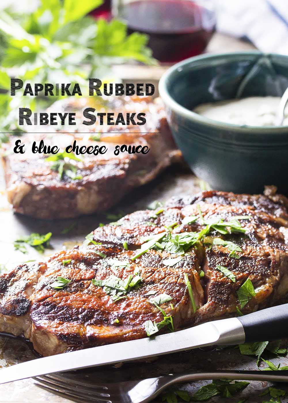 This Spanish inspired grilled ribeye steak is rubbed with paprika and smoked paprika and then topped with a blue cheese brandy sauce for an easy and flavorful main course. | justalittlebitofbacon.com