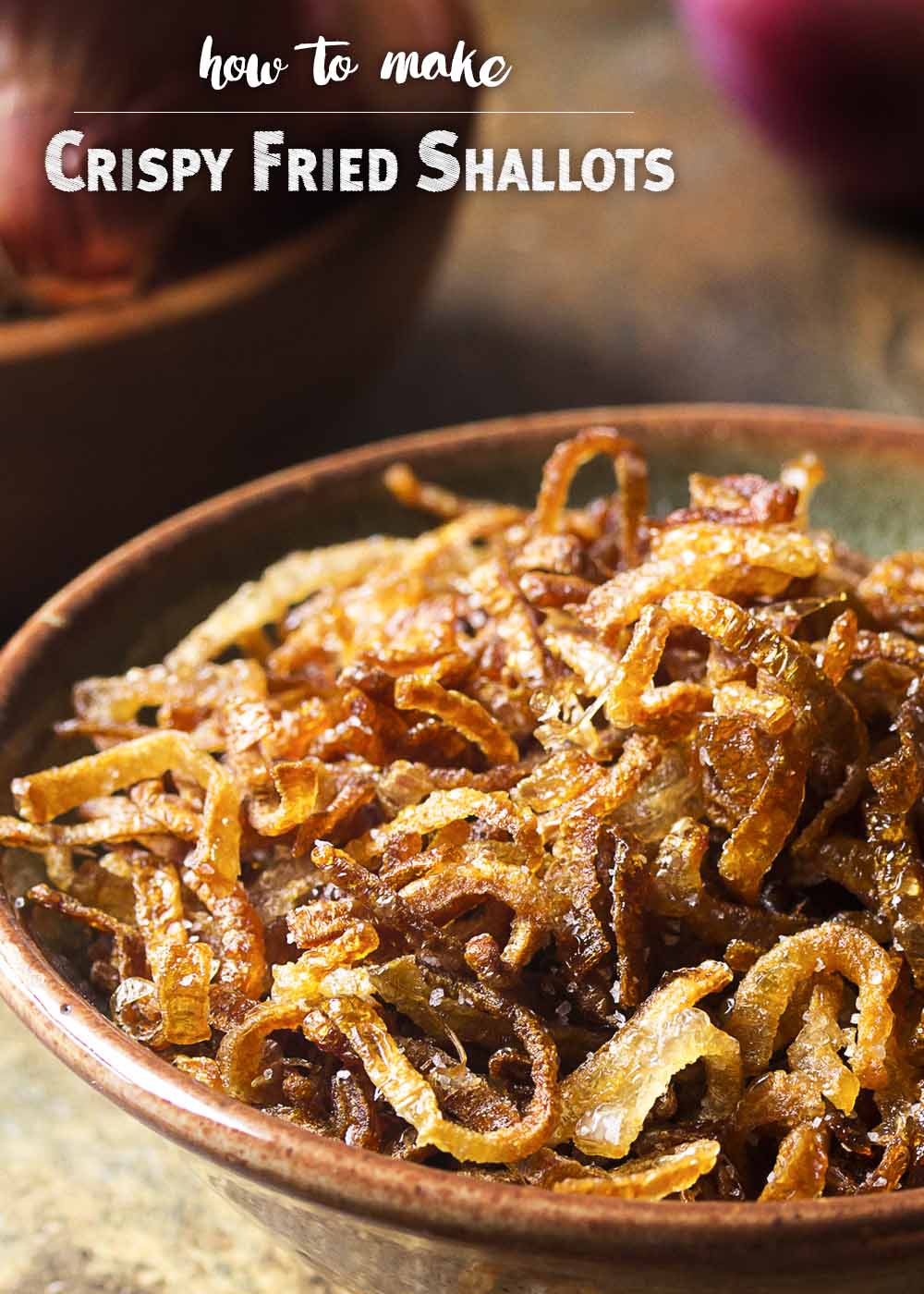 Making crispy fried shallots is a simple and easy process! All you need are three ingredients and a little time to get them golden brown. Gluten-free. Vegan. | justalittlebitofbacon.com