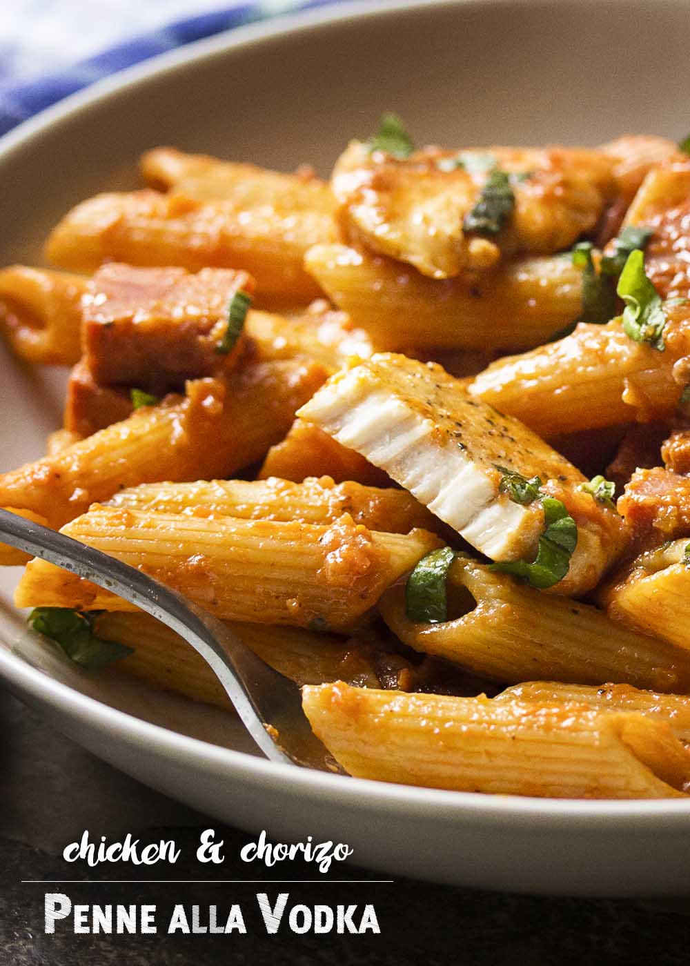 My penne alla vodka is creamy and full of deep tomato flavor from homemade marinara along with plenty of seared chicken and chorizo sausage. Easy weeknight meal! | justalittlebitofbacon.com