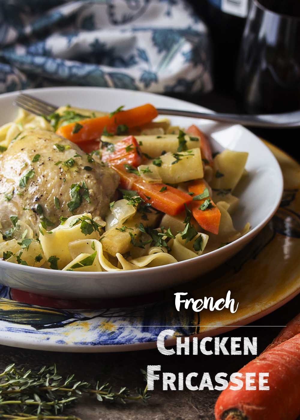 My quick French chicken fricassee is comfort food for a weeknight dinner. Boneless, skinless chicken thighs are braised along with root vegetables in white wine and then finished with a bit of cream and egg yolks to make a smooth and silky sauce. | justalittlebitofbacon.com