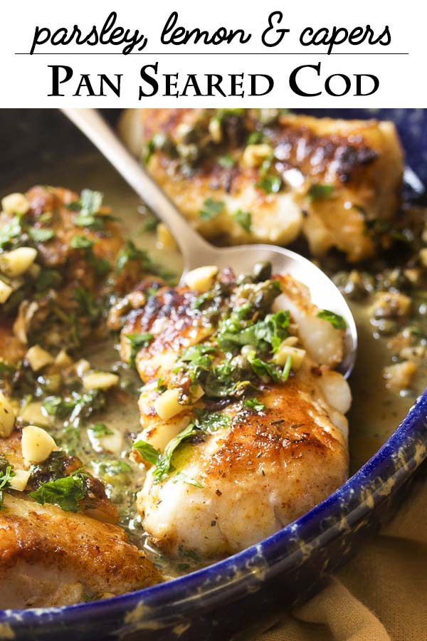 Thick cut cod is pan seared in a mixture of olive oil and butter to produce a golden brown crust and then served with a lemon, parsley, and caper sauce to make a simple and healthy weeknight meal. | justalittlebitofbacon.com #italianrecipes #dinnerrecipes #fishrecipes #mediterraneandiet #codrecipes #italianfood