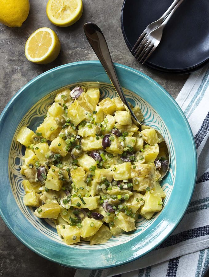 Looking for the best potato salad? Then you need to try my potato salad with olives and capers all tossed together with a homemade mayonnaise. Lemony, creamy, buttery, and tangy!