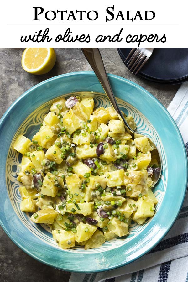 Looking for the best potato salad? Then you need to try my potato salad with olives and capers all tossed together with a homemade mayonnaise. Lemony, creamy, buttery, and tangy! | justalittlebitofbacon.com #sidedish #potatoes #potatosalad #salads #partyfood