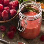 Put down the bottled salad dressing and jazz up your salads with a fresh raspberry balsamic vinaigrette! It's simple to make. Just a few minutes and a blender and you'll have a thick, sweet and spicy dressing for salads, chicken, salmon, and more.