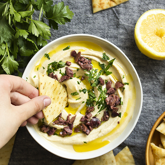 Zahav's classic recipe for Israeli hummus bi tahini is the best homemade hummus you can make! It's silky, smooth, creamy, light, and addictively yummy.