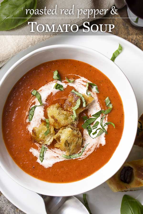 Comfort food at its best! Roasted red pepper and tomato soup is easy, creamy, and perfect for weeknight dinner or for company. Great with fried croutons, slices of crusty bread, or grilled cheese. | justalittlebitofbacon.com #souprecipes #tomatosoup #tomatoes #redpeppers #comfortfood